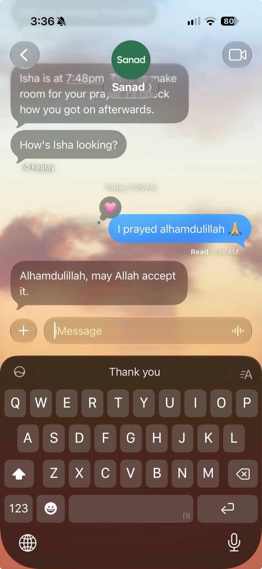 A Sanad chat in Messages: the Isha reminder, the check-in &ldquo;How&rsquo;s Isha looking?&rdquo;, the reply &ldquo;I prayed alhamdulillah&rdquo; with a heart on it, and Sanad&rsquo;s &ldquo;Alhamdulillah, may Allah accept it.&rdquo;